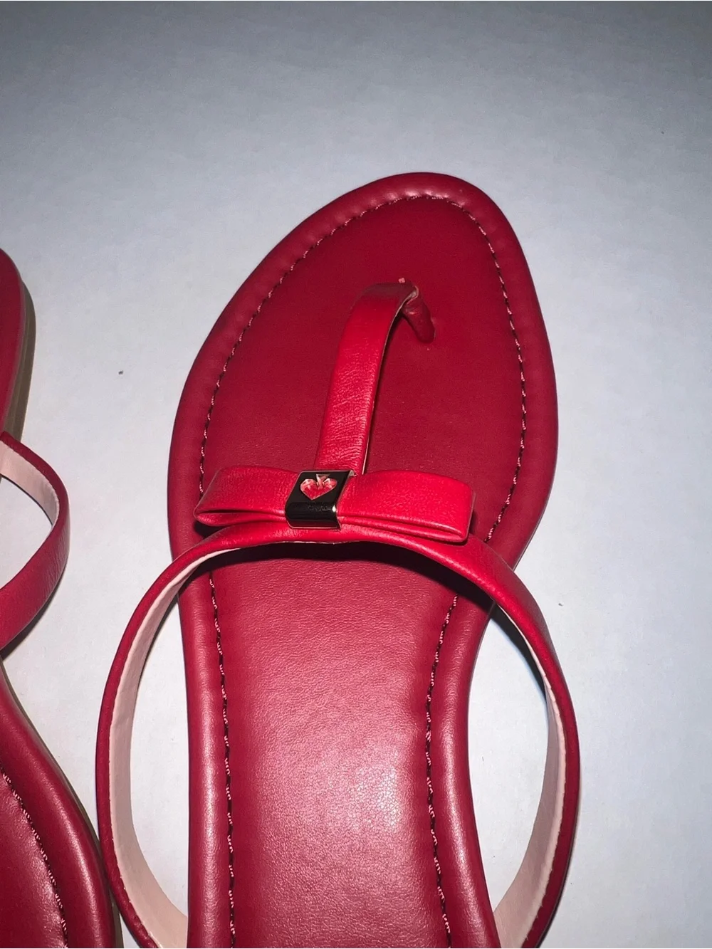 kate spade Red Leather T-Strap Sandals with Gold Spade Accent